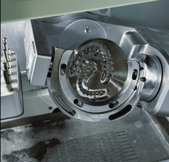 wet milling on titanium blocks in dental laboratory